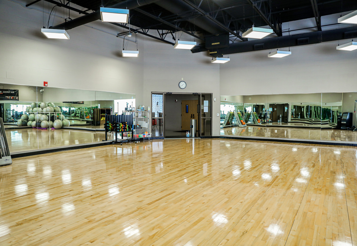 City Center Fitness hardwood dance studio with mirrors